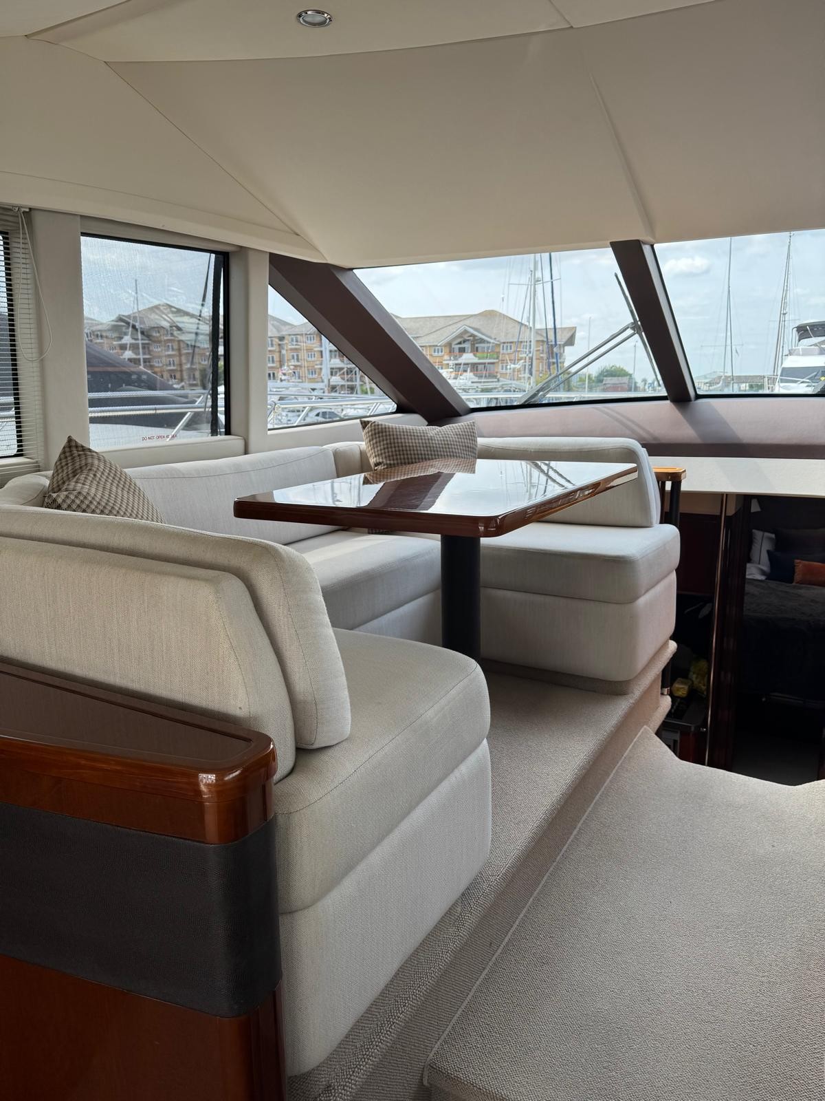 This is the second, indoor seating area, alongside the skippers internal helm, with a great view